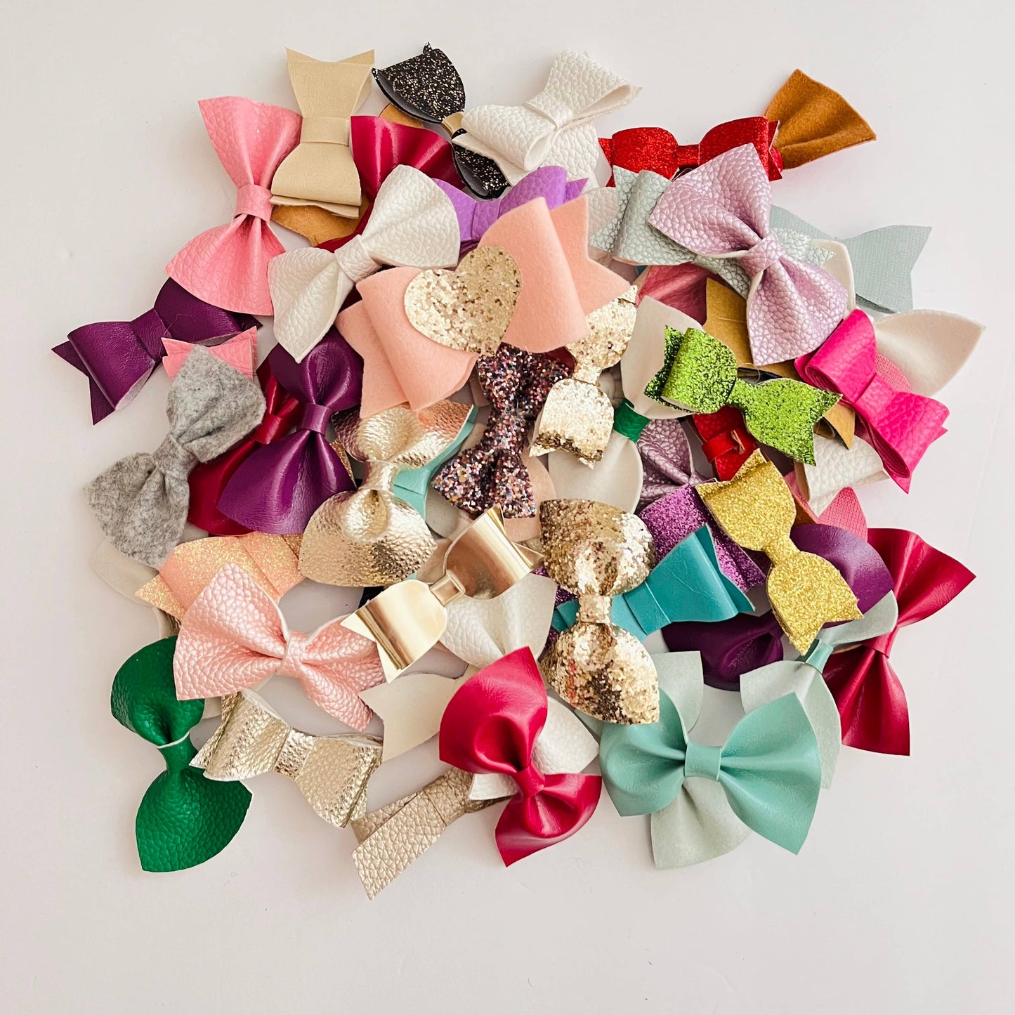 Faux leather baby bows, glitter baby bows